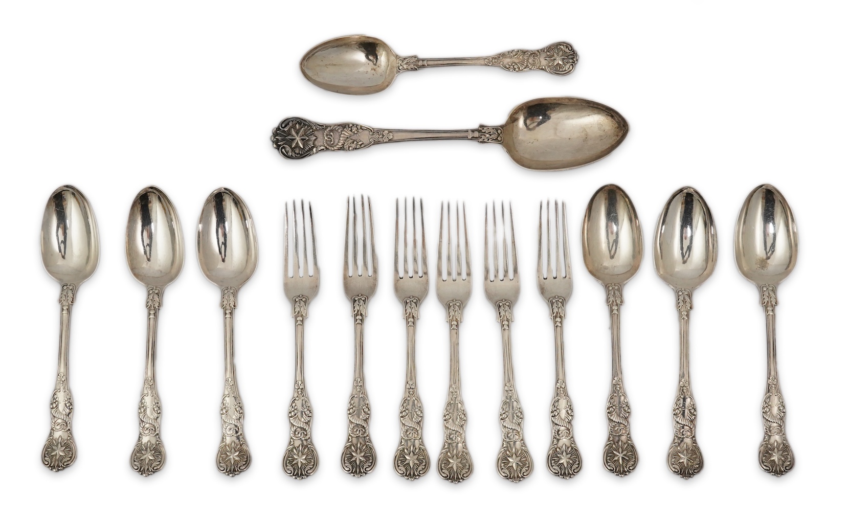 A part canteen of early Victorian silver flatware, by Robert Wallis, double struck with an unusual pattern with entwined cornucopia and a raised star terminal